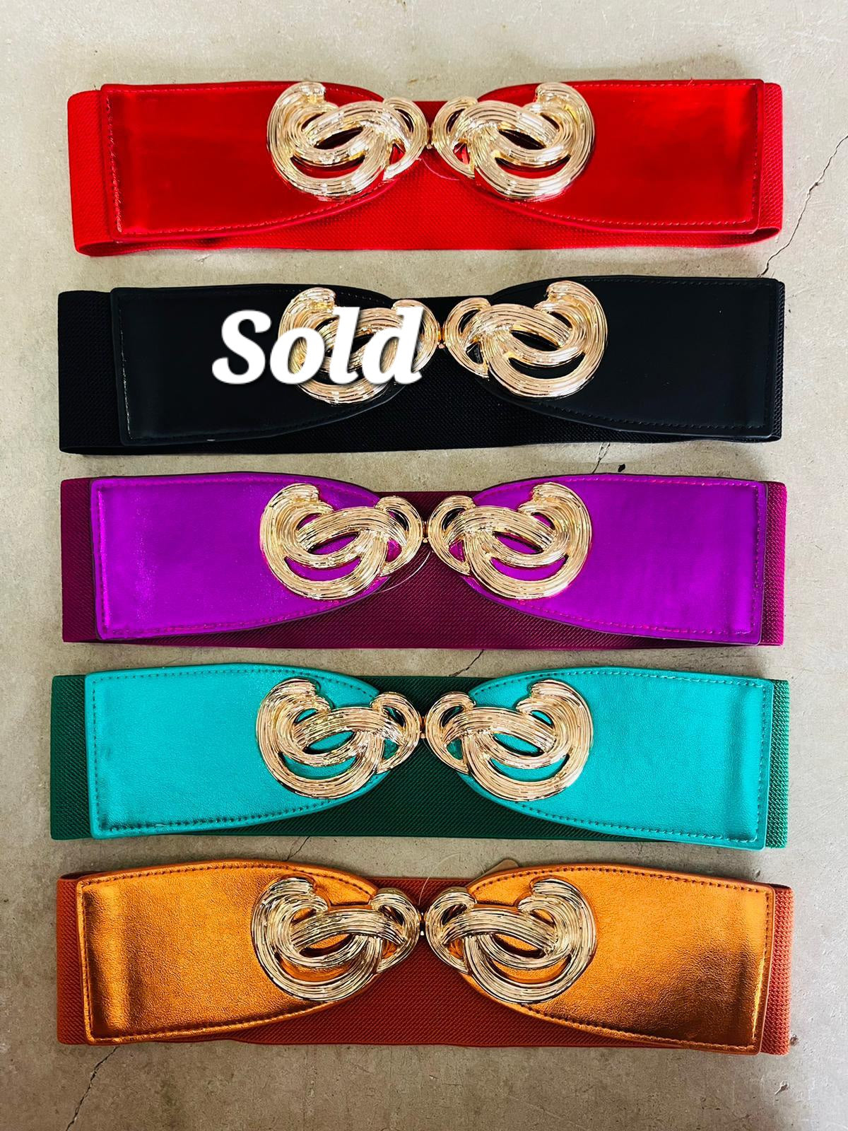 Metallic knot belt