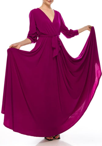 Magenta solid ity wrap maxi dress. 3/4 bell sleeves. Also available in black and royal blue.