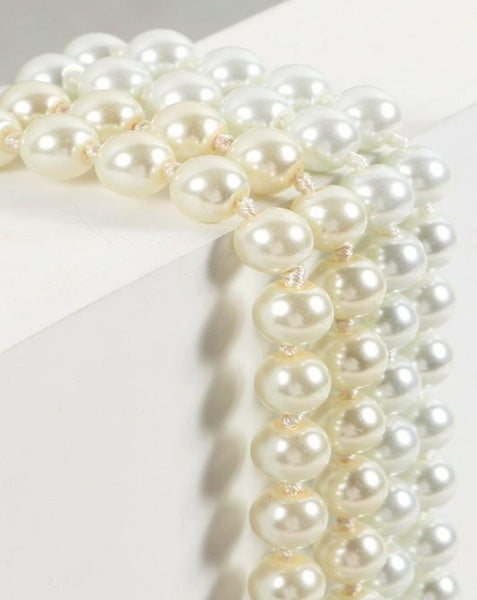 Pearl necklaces. Cream and white. 60"