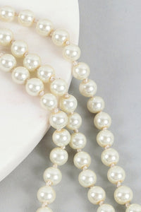 Pearl necklaces. Cream and white. 60"