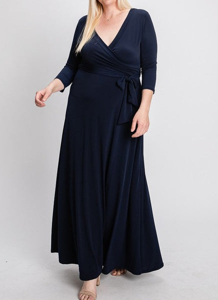 Black Plus 3/4 sleeve wrap over maxi dress.  Solid ity.   95% Polyester 5% Spandex