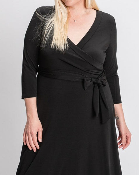 Black Plus 3/4 sleeve wrap over maxi dress.  Solid ity.   95% Polyester 5% Spandex