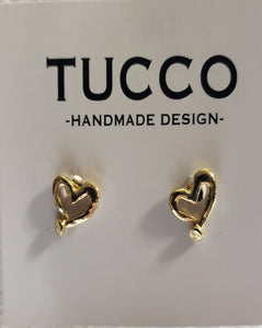 Tucco gold heart shape earrings.