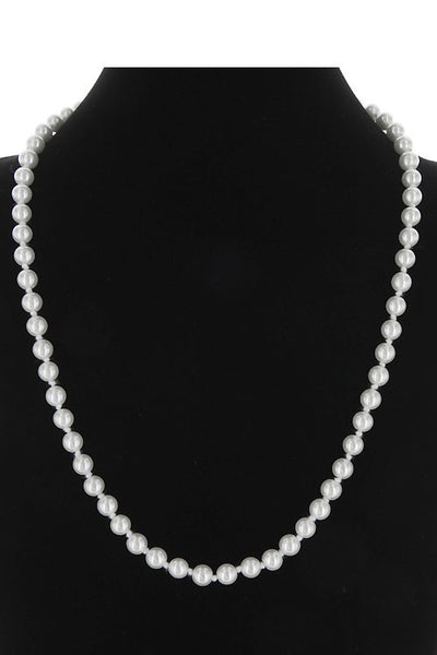 Cream and white pearls necklace.  18"