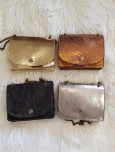 Leather clutch handbags.