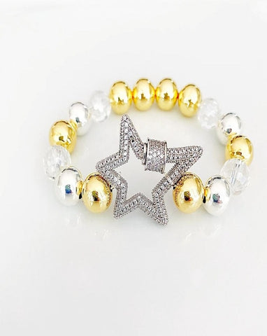 Star clasp and gold bracelet.